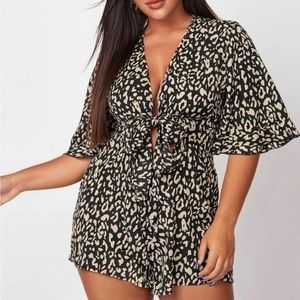 Leopard print plunge neckline romper from SHEIN in a size 2X. Never worn